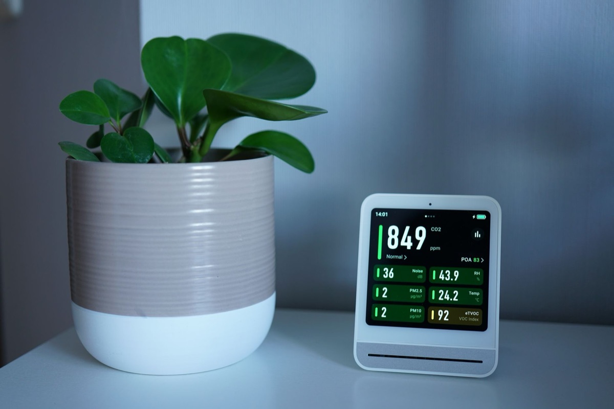 Modern air purifier operating in a clean living room environment